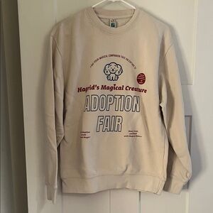 'Hagrid's Magical Creature Adoption Fair' Sweatshirt